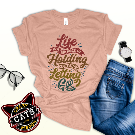 Life Is A Balance Of Holding On By Rumi Unisex Light T-Shirt